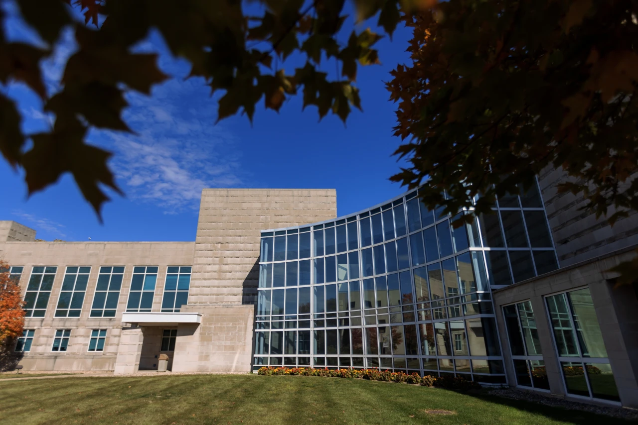 Photo of the curved glass and stone exterior of an IU Kokomo building