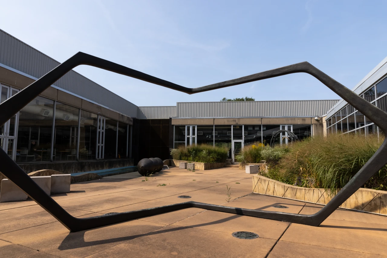 Photo of the IU Northwest campus with a large geometric public sculpture